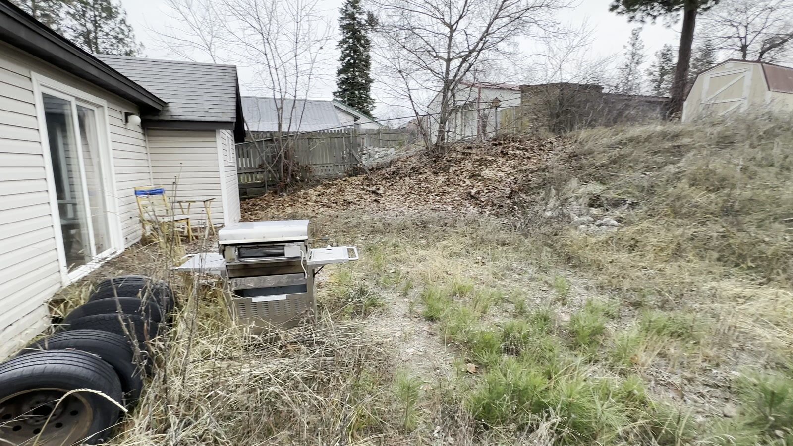 15244 N Alabama St before rehab, back slider
