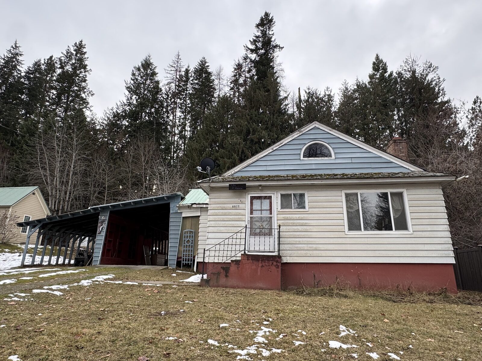6972 Oak St before rehab, exterior