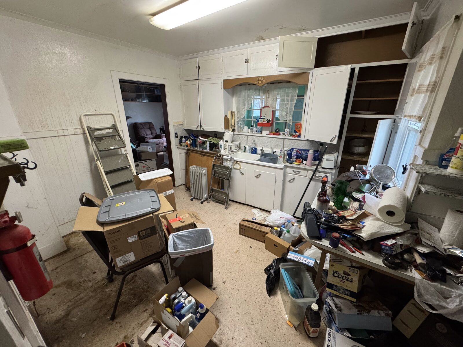 6972 Oak St before rehab, kitchen