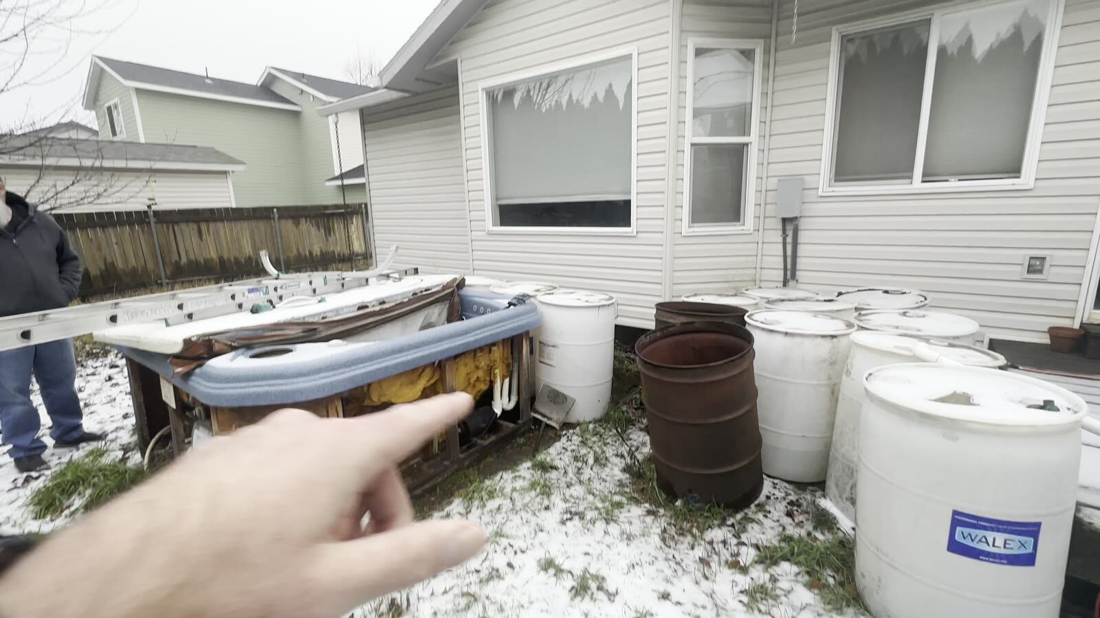 521 N Stephanie St before rehab, yard
